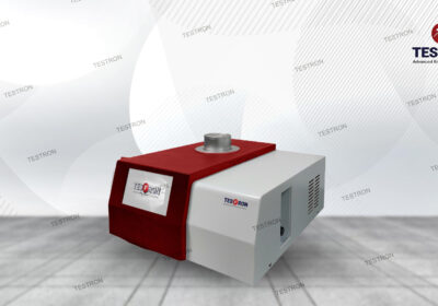 Professional laboratory technician using a Testron Group TT-DSC300 for differential scanning calorimetry applications on industrial polymers.