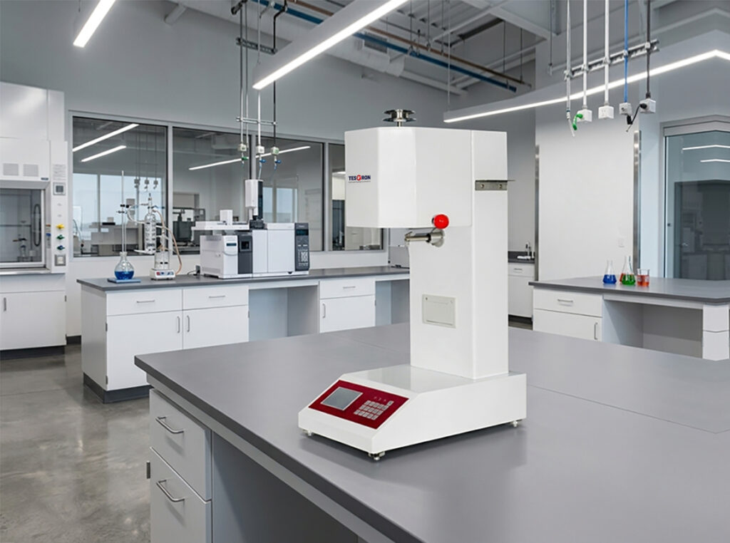 Multi-station quality control bench equipped with an automated melt flow index testing machine.
