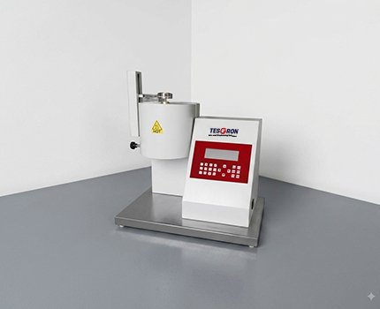Automated multi-station melt flow index testing machine operating in a polymer production lab.